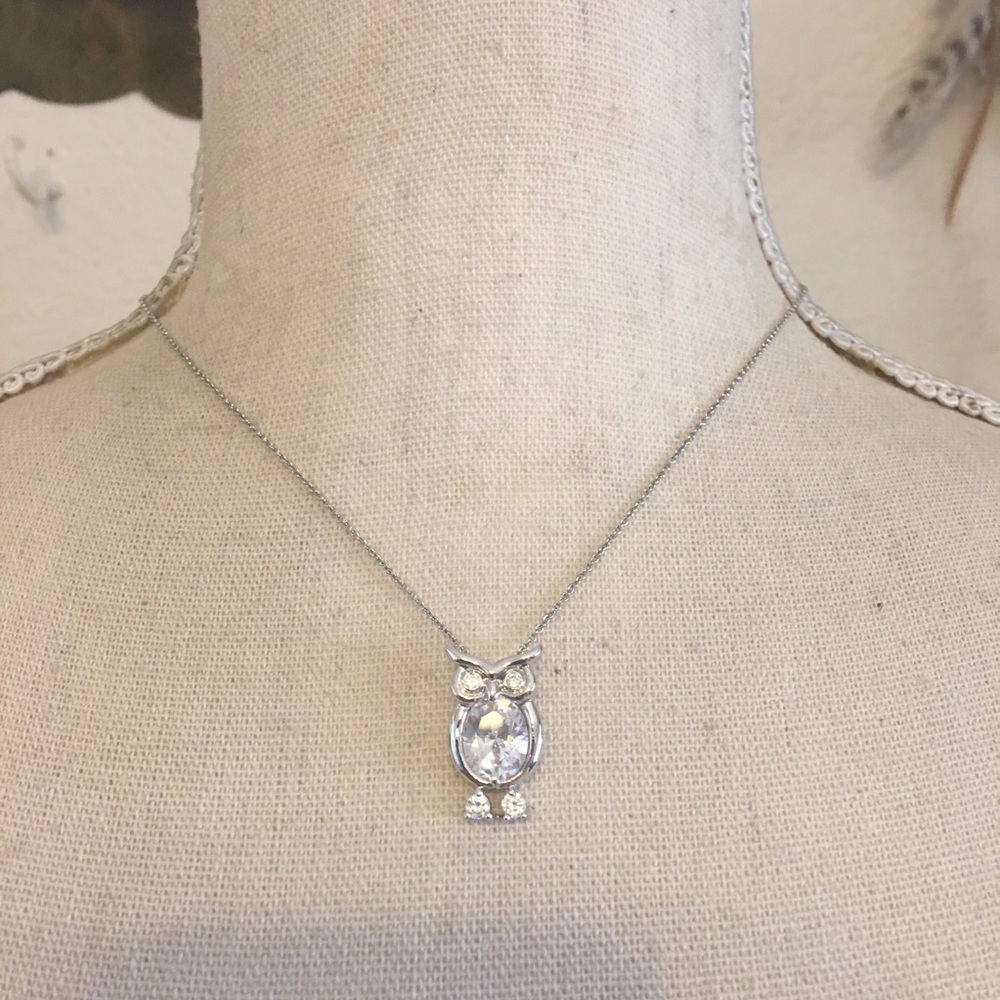 Faceted stone owl pendant on silver plated chain